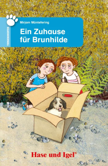 Der Welpe im Karton